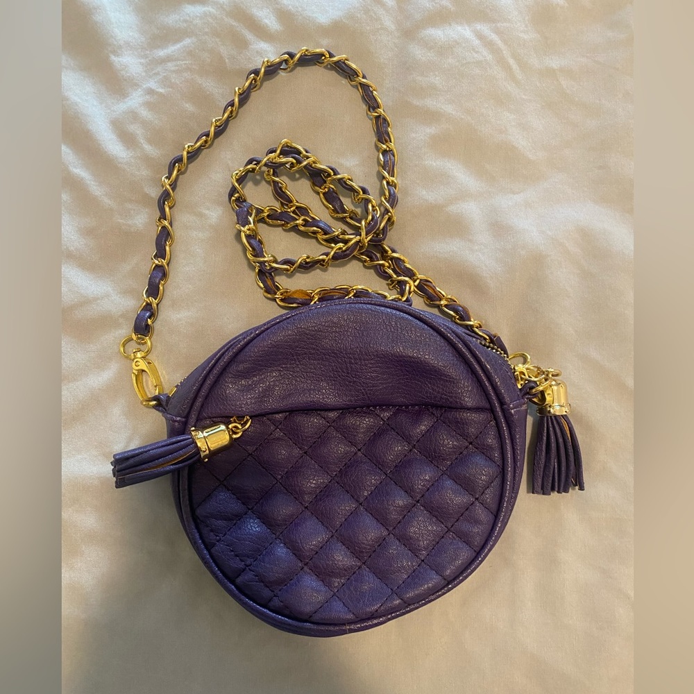 This is a super cute purple going out purse.